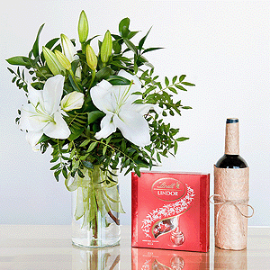 Gift set "Lilies, sweets and non-alcoholic wine" with delivery Yekaterinburg