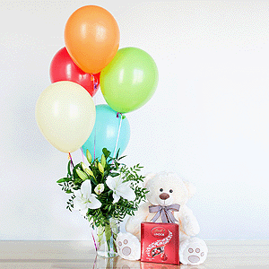 Gift set "Lilies, teddy bear, balloons and sweets" with delivery Yekaterinburg