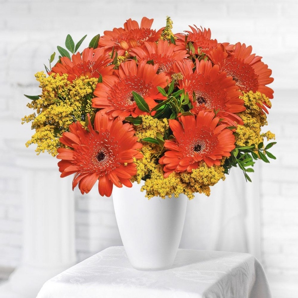 Gerbera daisies - 9, Solidago (1 pc.), Pistachio, Mesh (Abaka), Ribbon