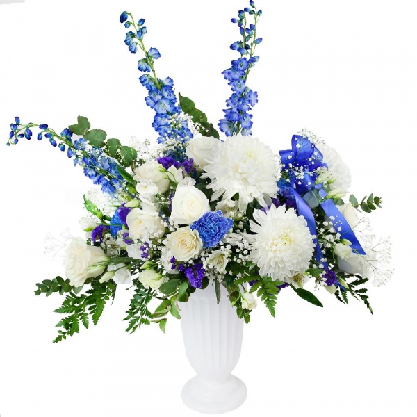 Magnum White Chrysanthemum - 4, White rose 50 cm - 12, lisianthus - 4, Alstromeria white, soft pink - 3, Blue carnation - 4, Gypsophila - 2, Oasis, Blue Delphinium, Blue Statice, Fern (1 pc.), Eucalyptus Cinerea, Ribbon