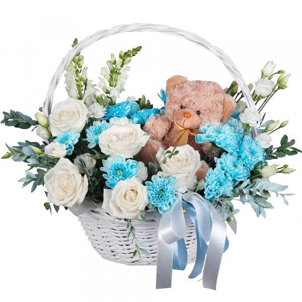 White Matthiola - 2, White rose 50 cm - 9, Chrysanthemum spray Baltica painted blue - 3, White spray carnation - 4, lisianthus - 3, Medium Basket, Oasis, Pistachio, Teddy bear 20 cm, Ribbon