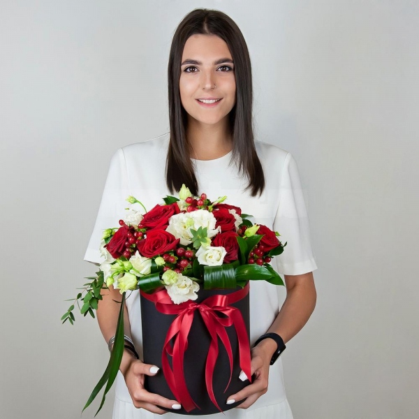 Red rose 50 cm - 9, lisianthus - 5, Round flower box medium, Oasis, Film, Ruscus, Aspidistra (1 pc.), Hypericum, Eucalyptus parvifolia (1 pc.), Ribbon