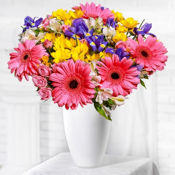 Bright pink spray rose mix, 50 cm - 5, Gerbera pink - 5, Bacardi Yellow Spray Chrysanthemum - 4, Irises - 8, Alstromeria white, soft pink - 5, Sisal, Ribbon