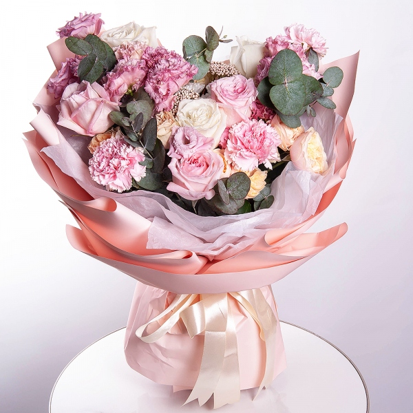White rose 50 cm Ecuador - 3, Peony rose pink 'OHara' - 3, Pink Lisianthus (Eustoma) - 3, Baltica White Spray Chrysanthemum - 1, Spray rose: white, cream, light pink 50 cm - 5, Pink carnation - 7, Eucalyptus, Ozotamnus, Wrapping Paper