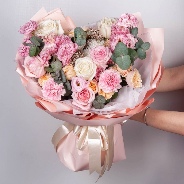White rose 50 cm Ecuador - 5, Peony rose pink 'OHara' - 3, Pink Lisianthus (Eustoma) - 3, Baltica White Spray Chrysanthemum - 2, Spray rose: white, cream, light pink 50 cm - 5, Pink carnation - 9, Eucalyptus, Ozotamnus, Wrapping Paper
