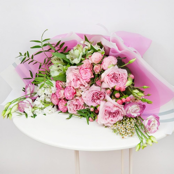 Peony rose pink 'OHara' - 5, Pink Lisianthus (Eustoma) - 2, Spray rose: white, cream, light pink 50 cm - 2, Alstromeria white, soft pink - 2, White Matthiola - 2, Hypericum, Waxflower (1 pc.), Wrapping Paper, Pistachio