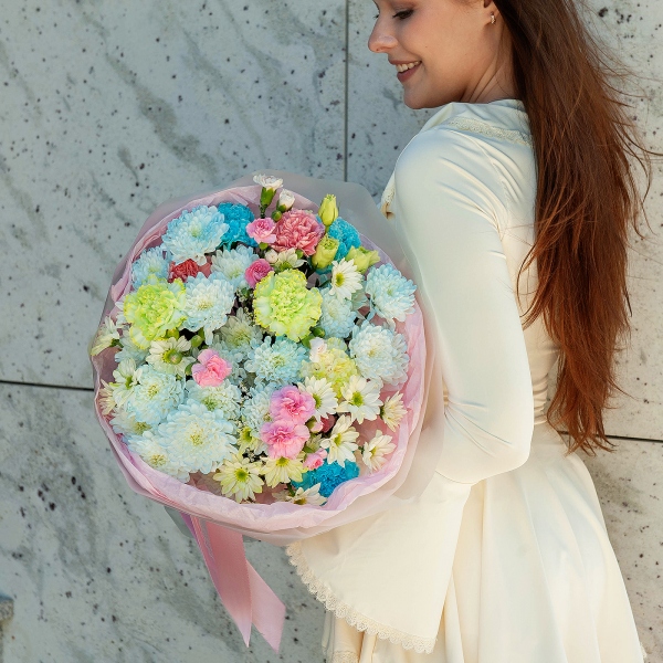 Chrysanthemum spray Baltica painted blue - 4, Pink carnation - 6, Carnation white, cream - 10, Bacardi Yellow Spray Chrysanthemum - 4, Pink spray carnation - 9, Limonium (1 pc.), Wrapping Paper