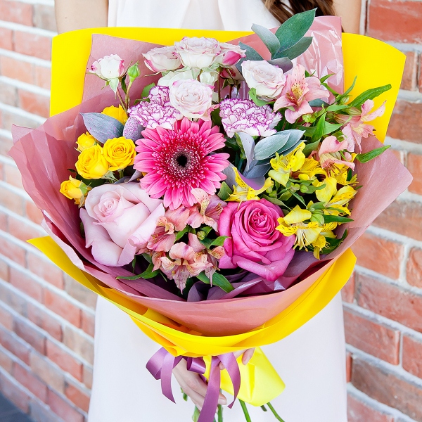 Gerbera pink - 3, Alstromeria white, soft pink - 2, Pink carnation - 3, Spray rose: yellow, orange 50 cm - 2, Pink rose 50 cm - 4, Alstromeria Yellow, Orange - 1, Spray rose: white, cream, light pink 50 cm - 1, Ruscus, Wrapping Paper