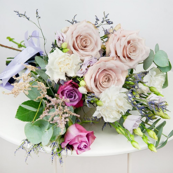 lisianthus - 4, Carnation white, cream - 5, Deep Purple rose - 4, Rose Powder 50 cm Ecuador (Quicksand, Menta) - 5, Limonium (1 pc.), Eucalyptus Cinerea, Ribbon