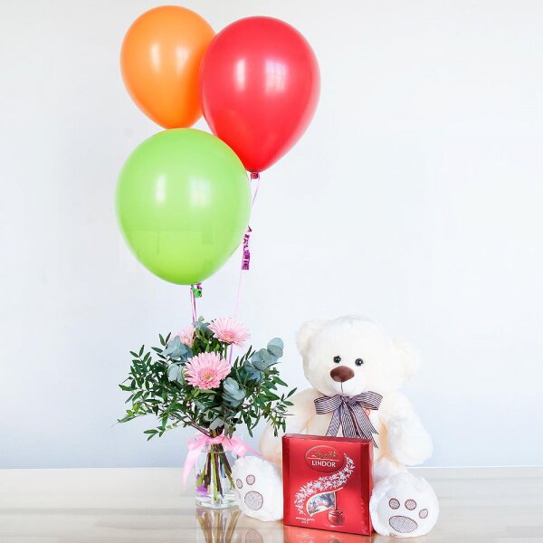 Gerbera pink - 3, Pistachio, Eucalyptus Cinerea, Ribbon, Lindt Candy Box, Taddy Bear 45 cm, Helium Balloon (1 pc.)