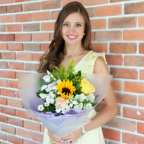 Sunflower - 1, Yellow rose 50 cm - 2, Carnation white, cream - 1, Santini White Spray Chrysanthemum - 2, Alstromeria white, soft pink - 1, lisianthus - 2, Solidago (1 pc.), Ruscus, Ribbon, Wrapping Paper