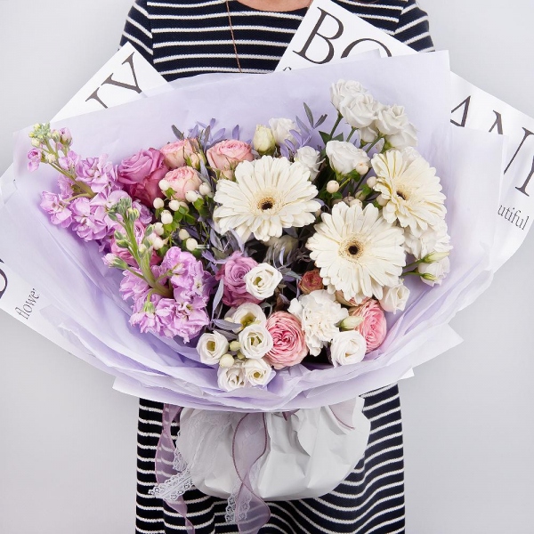 Gerbera white - 3, Pink rose 50 cm - 5, Peony sprayrose - 3, Carnation white, cream - 4, Matthiola Lilac - 2, lisianthus - 3, Hypericum, Pistachio, Wrapping Paper
