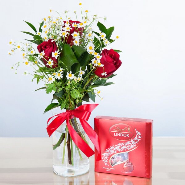 Red rose 50 cm - 5, Chamomile - 3, Aspidistra (1 pc.), Ruscus, Ribbon, Lindt Candy Box