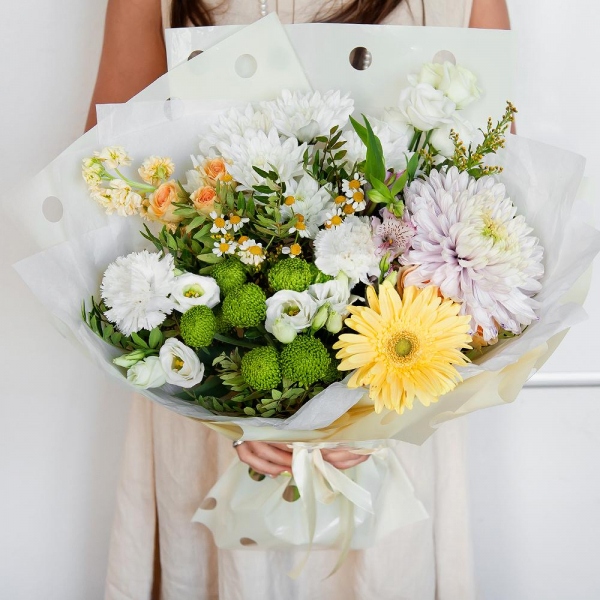 Chamomile - 1, Baltica White Spray Chrysanthemum - 1, Athos pom Feeling Green - 1, Alstromeria white, soft pink - 1, lisianthus - 2, Spray rose: white, cream, light pink 50 cm - 2, White Matthiola - 1, Carnation white, cream - 2, Magnum Purple Chrysanthemum - 1, Gerbera yellow - 1, Solidago (1 pc.), Pistachio, Wrapping Paper