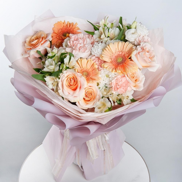 Cream gerbera - 3, Baltica White Spray Chrysanthemum - 2, Carnation white, cream - 5, Cream Rose 50 cm Ecuador (Creme Caramel) - 5, Alstromeria white, soft pink - 3, lisianthus - 2, Wrapping Paper